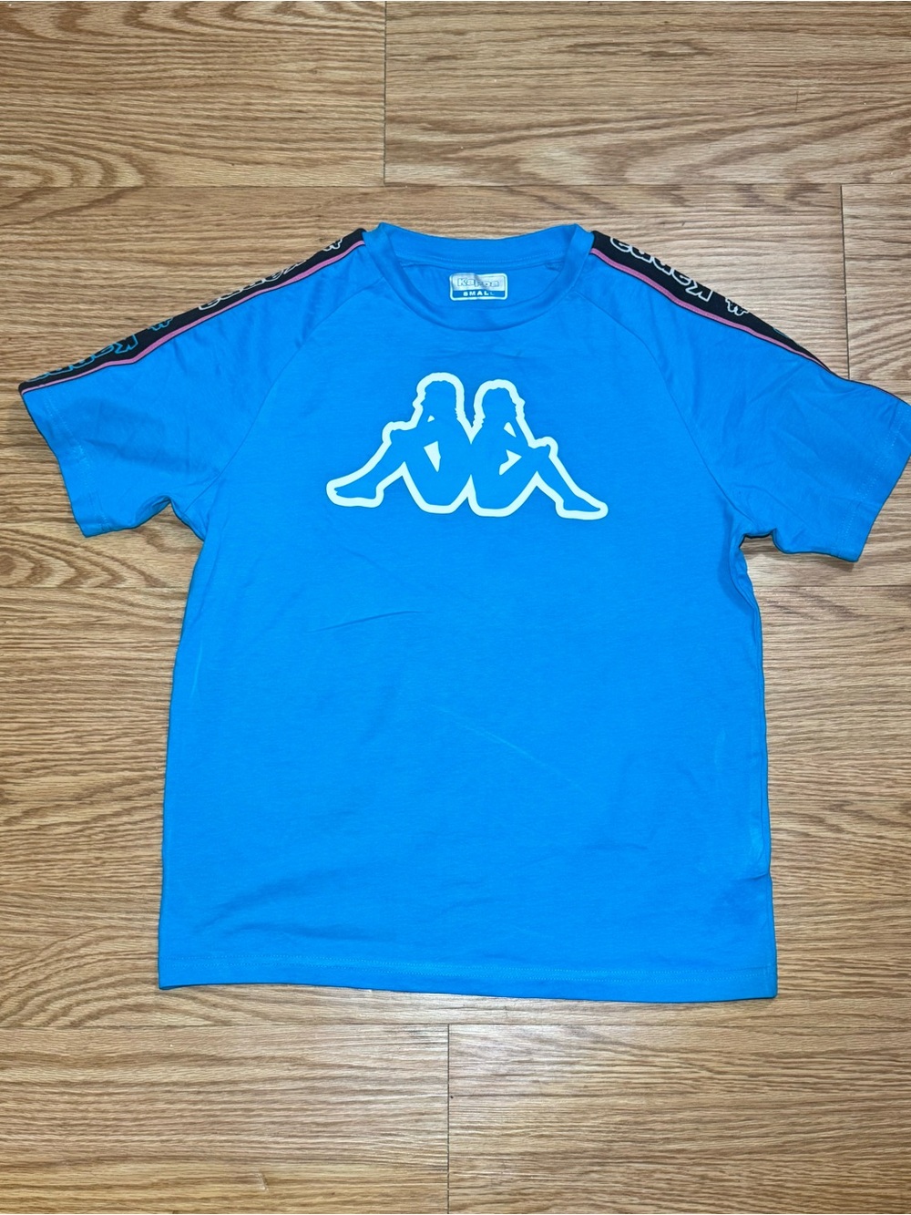 Kappa Blue Tee with White Silhouette Graphic